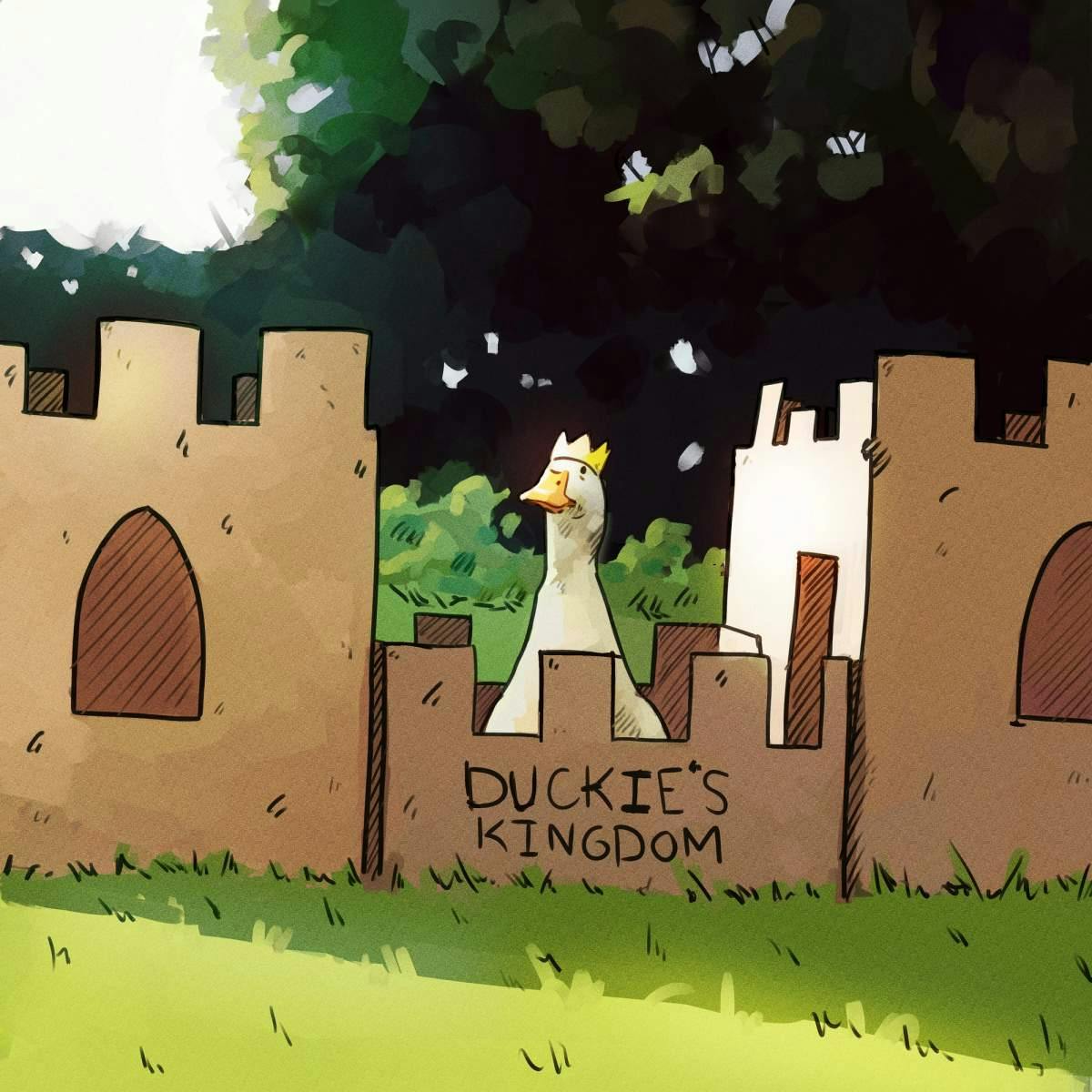 Cartoon duck wearing a crown in front of a cardboard castle.